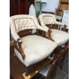 A pair of continental style button back inlaid tub chairs with turned legs
