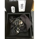 A boxed Emporio Armani necklace with charms