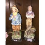 Pair of Continental pottery figures