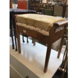 An oak piano stool