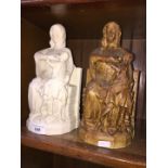 A pair of resin bookends of breast feeding ladies
