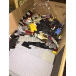 A large box of Lego Duplo/Lego type bricks, including a bag of 26 mini figures