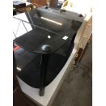 A black glass tv stand