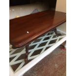 A mahogany coffee table