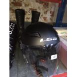 A motorcycle crash hat and pair of boots size EU 37