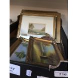 Box of small framed pictures