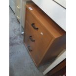 A small 3 drawer filing cabinet