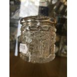 Silver top glass jar