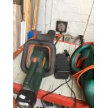 A Black & Decker GTC390 accu cordless hedge trimmer with battery and charger