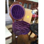 A continental style purple upholstered chair