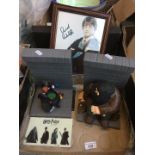 A box of Harry Potter bits and signed picture