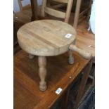 A small milking type stool