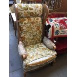 An American wing back armchair with bergere sides