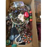 A small box of costume jewellery
