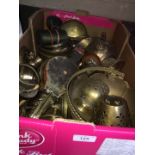 A box of brassware