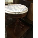 A marble top stand/table