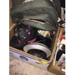 A box including a helmet, a JBL speaker, diecast toys etc.