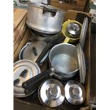 A box of vintage pans