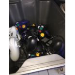 A box of game controllers - Sony, PS2