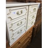 A pair of French style bedside cabinets