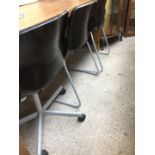 3 plastic office style chairs