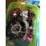 A box of misc vintage and modern jewellery to include necklaces, bracelets, cuffs, belt, etc