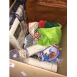 A box of misc birthday, Xmas and household items, a leather messenger bag, etc