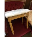 A dressing table stool