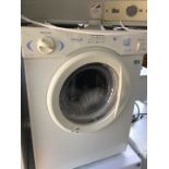 A small White Knight tumble dryer