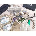 A mixed lot comprising costume jewellery, brass photo frame and a glass paper weight.