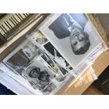 A box of film stills and scrapbook photo's 40's and 50's including John Wayne, Susan Hayward, (