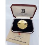 A silver gilt coin in commemoration of the death of Field Marshall Viscount Montgomery of Alamein,