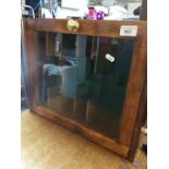 A small glazed display cabinet