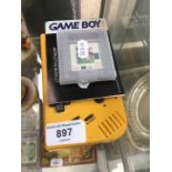 A GameBoy with booklet and Fifa 96 game in case