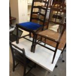 A pair of ladder back chairs