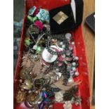 A box of misc vintage and modern jewellery to include necklaces, bracelets, earrings, etc