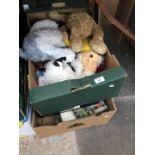 A box of soft toys and a box of magazines etc.