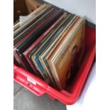 Red crate of LP records
