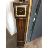 A Smiths electric oak cased granddaughter clock