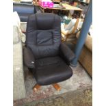 A black leather swivel armchair