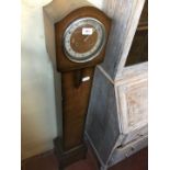 A Bentima oak cased granddaughter clock (no key or pendulum)
