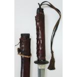 A Japanese WWII officer's katana with bound fish skin grip black lacquered scabbard and leather