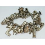 A hallmarked silver charm bracelet., length 15cm, wt. 97.7g.