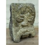 An early stone head, possibly Medieval, length 30cm.