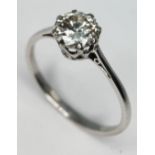 A diamond solitaire ring, the round cut diamond approx. 0.96 carats, band marked 'PLAT', gross wt.