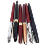 A group of six vintage fountain pens including a Parker with 14k gold nib.