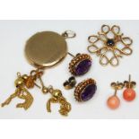 A mixed lot of 9ct gold comprising three pairs of earrings, a brooch and a locket, gross wt. 10.2g.