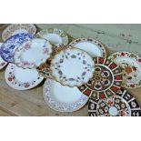 A group of 13 assorted Royal Crown Derby plates.