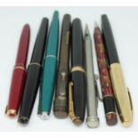 A group of eight fountain pens/pencils including two with 14ct gold nibs.