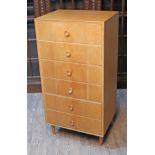 A Meredew retro light oak narrow chest of drawers, width 61cm, depth 46cm & height 124cm.